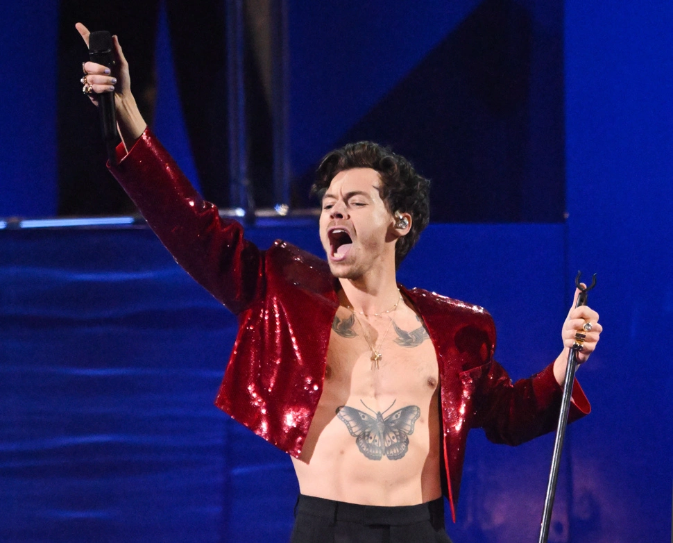 Harry Styles performs live on stage during The BRIT Awards 2023 - © Getty